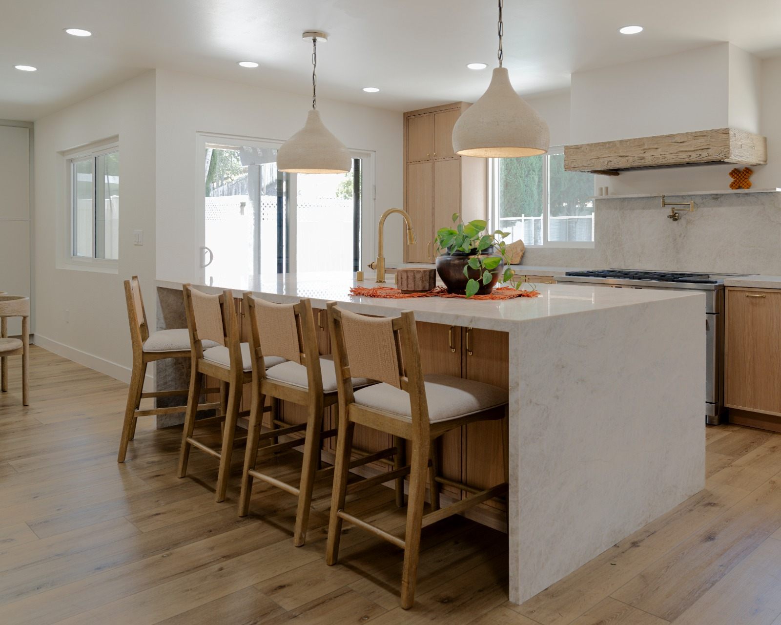 Kitchen remodel with waterfall island by the ARKO Remodeling team