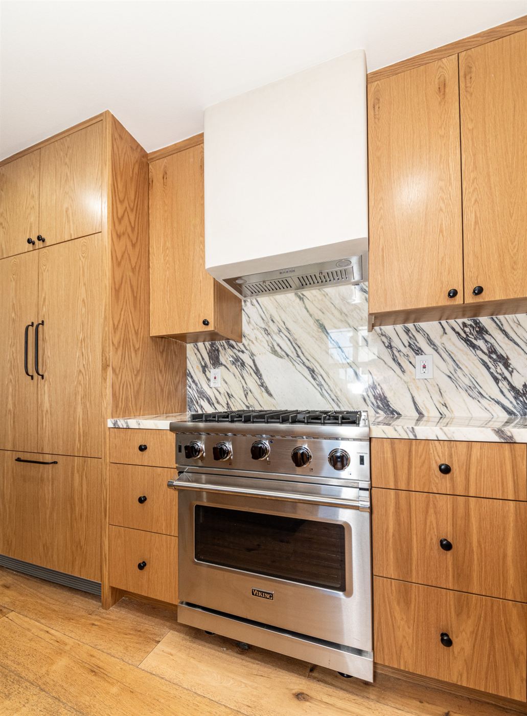 Marina del Rey kitchen remodel â€” warm wood cabinetry with clean modern lines, by ARKO Remodeling