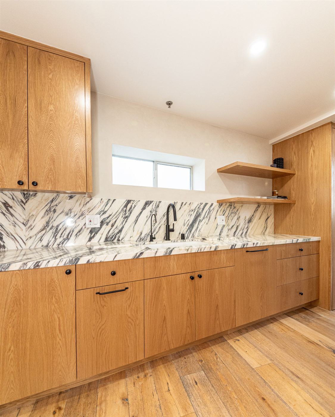 Marina del Rey kitchen remodel â€” warm wood cabinetry with clean modern lines, by ARKO Remodeling