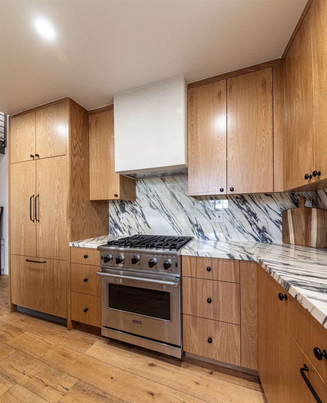 Marina del Rey kitchen remodel â€” warm wood cabinetry with clean modern lines, by ARKO Remodeling