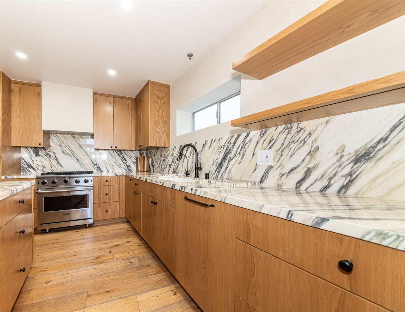 Marina del Rey kitchen remodel â€” warm wood cabinetry with clean modern lines, by ARKO Remodeling