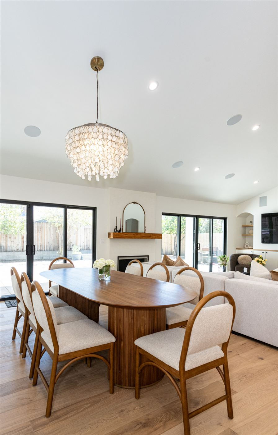 Open-plan dining area with ribbed pedestal table