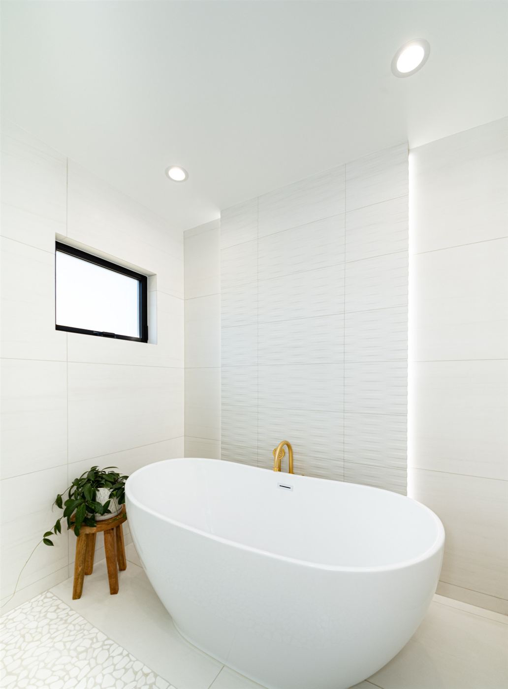 Bathroom with oval freestanding tub
