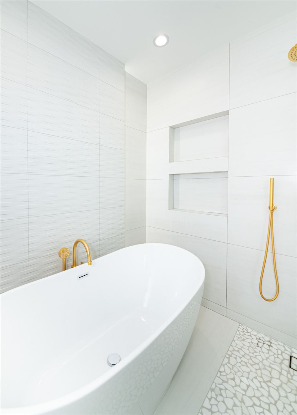 Minimalist bathroom with freestanding tub
