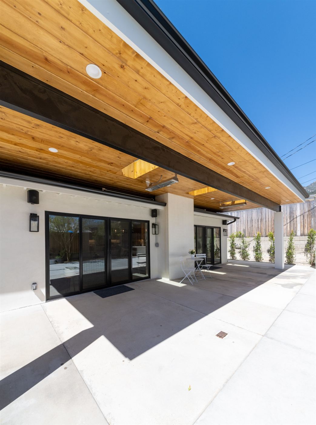 Modern single-story house exterior with deep overhang