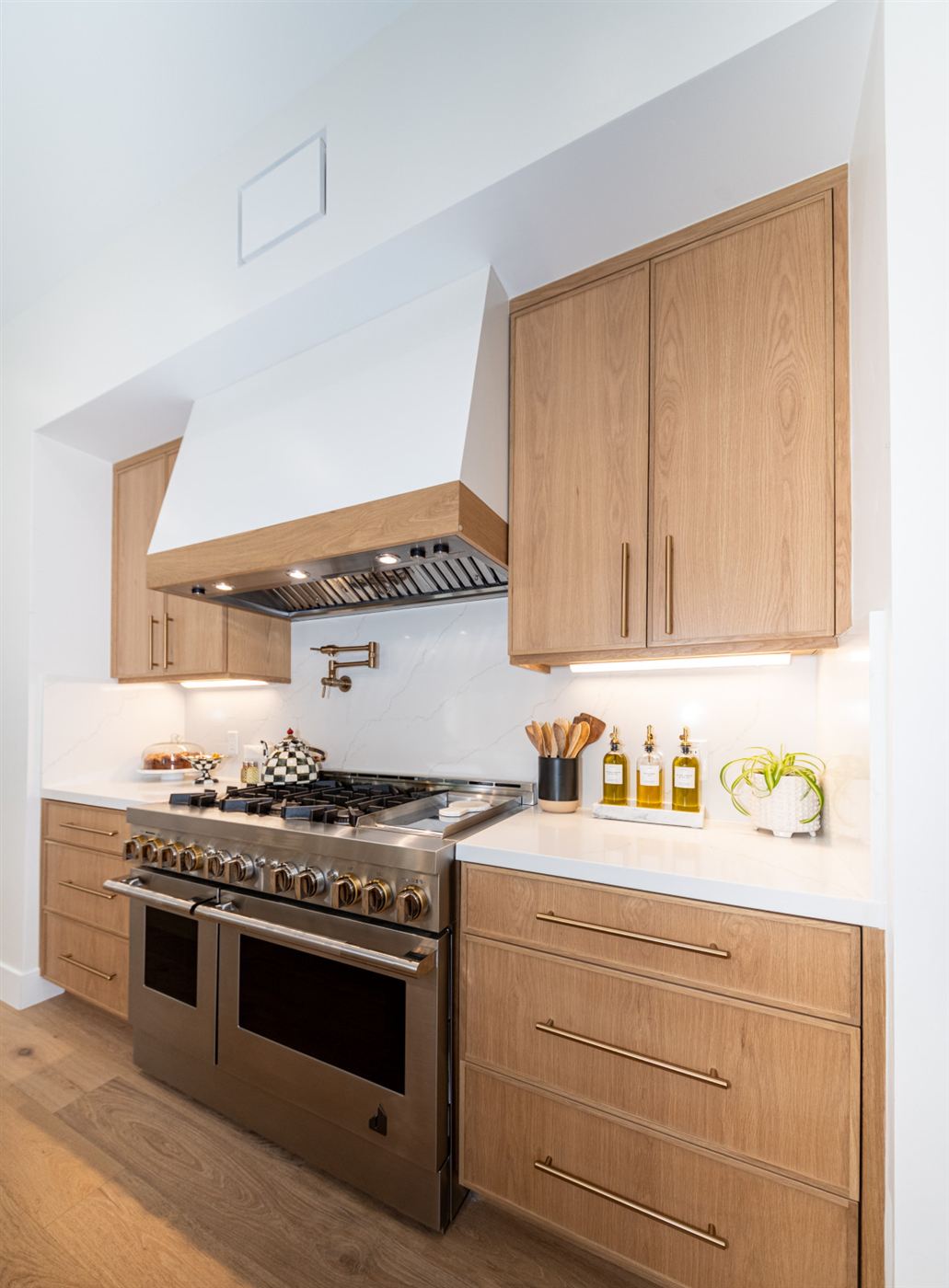 Pasadena modern kitchen â€” light wood cabinets with brass hardware, by ARKO Remodeling