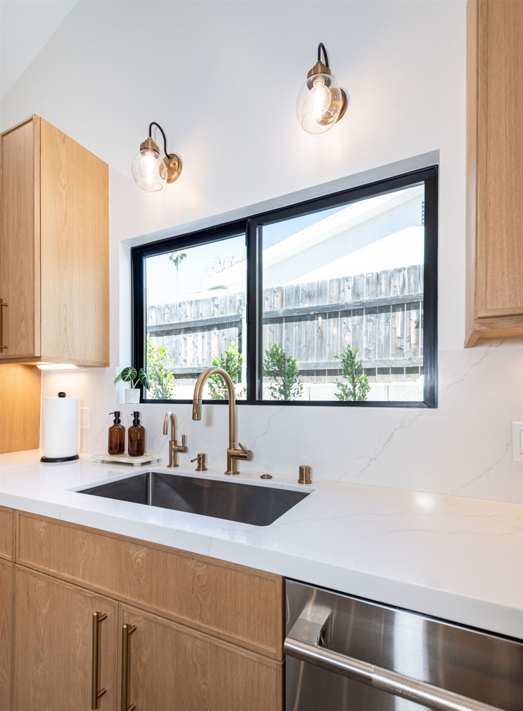 Pasadena modern kitchen â€” light wood cabinets with brass hardware, by ARKO Remodeling