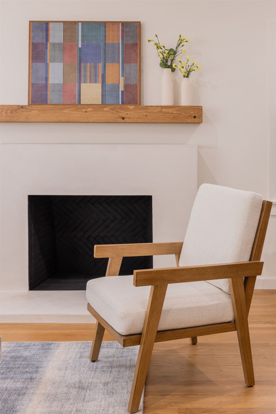 Modern living room with minimalist fireplace and dark patterned insert