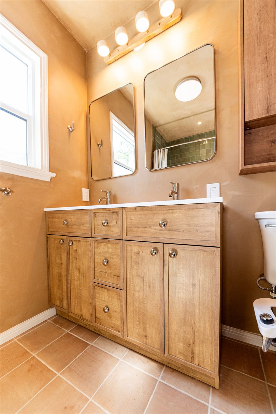 Woodland Hills bathroom â€” custom oak double vanity with white quartz countertop, by ARKO Remodeling